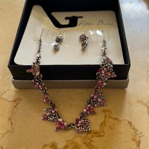 Pink earrings and necklace set .
